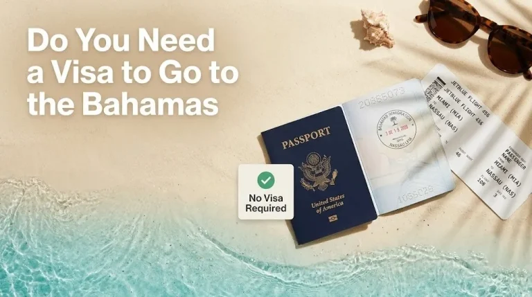 Overhead flat-lay of U.S. passport with Bahamas entry stamp boarding pass to Nassau and tropical items on sand surface.