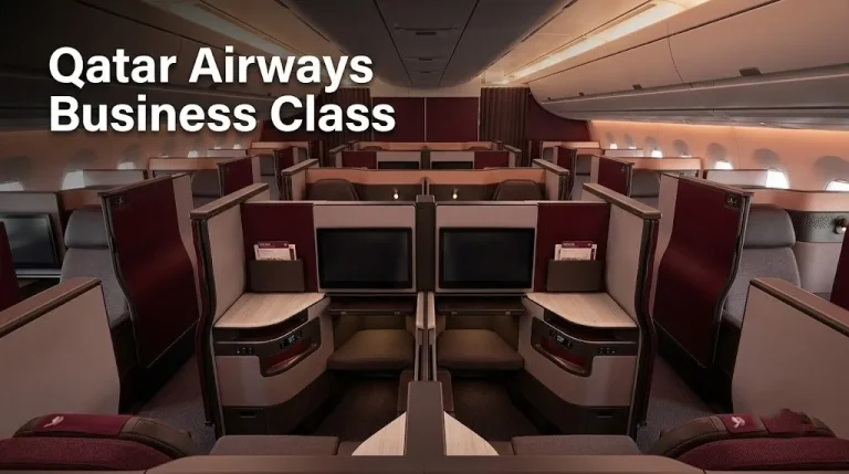 Qatar Airways Qsuite business class cabin on Airbus A350-1000 showing private suites with sliding doors for Qatar Airways Business Class review.
